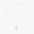 Abstract S-curve sterling silver pendant with zirconia accents on delicate chain against white background