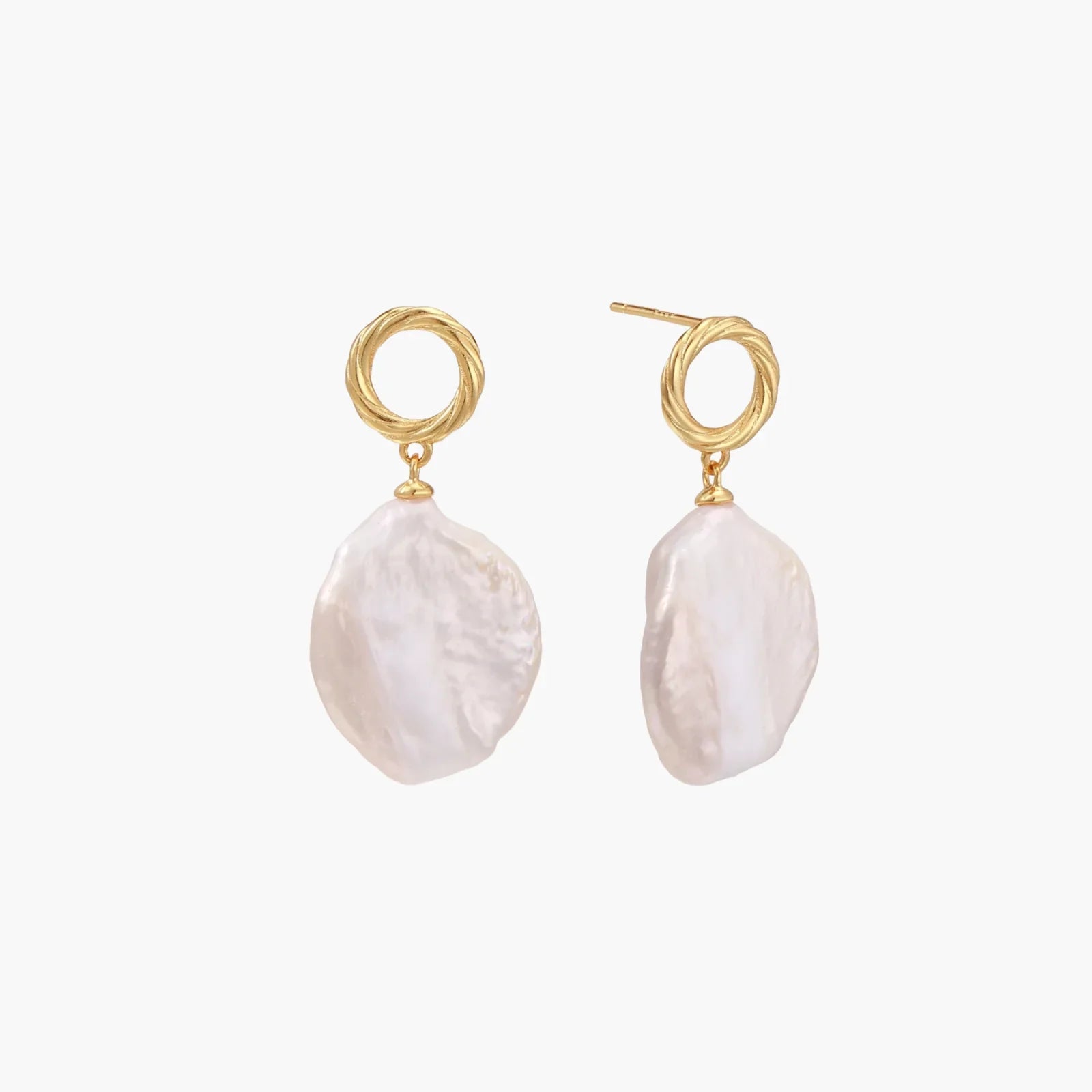 18K gold vermeil twisted circle studs with organic white baroque pearl drops on cream background