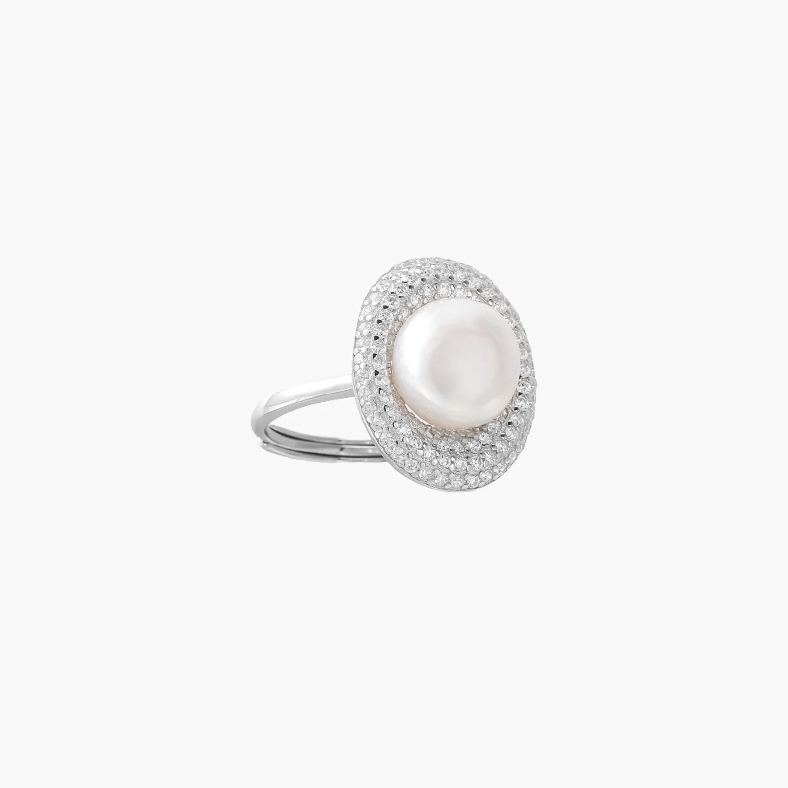 Silver ring with lustrous white pearl center surrounded by sparkling crystal halo on light background.
