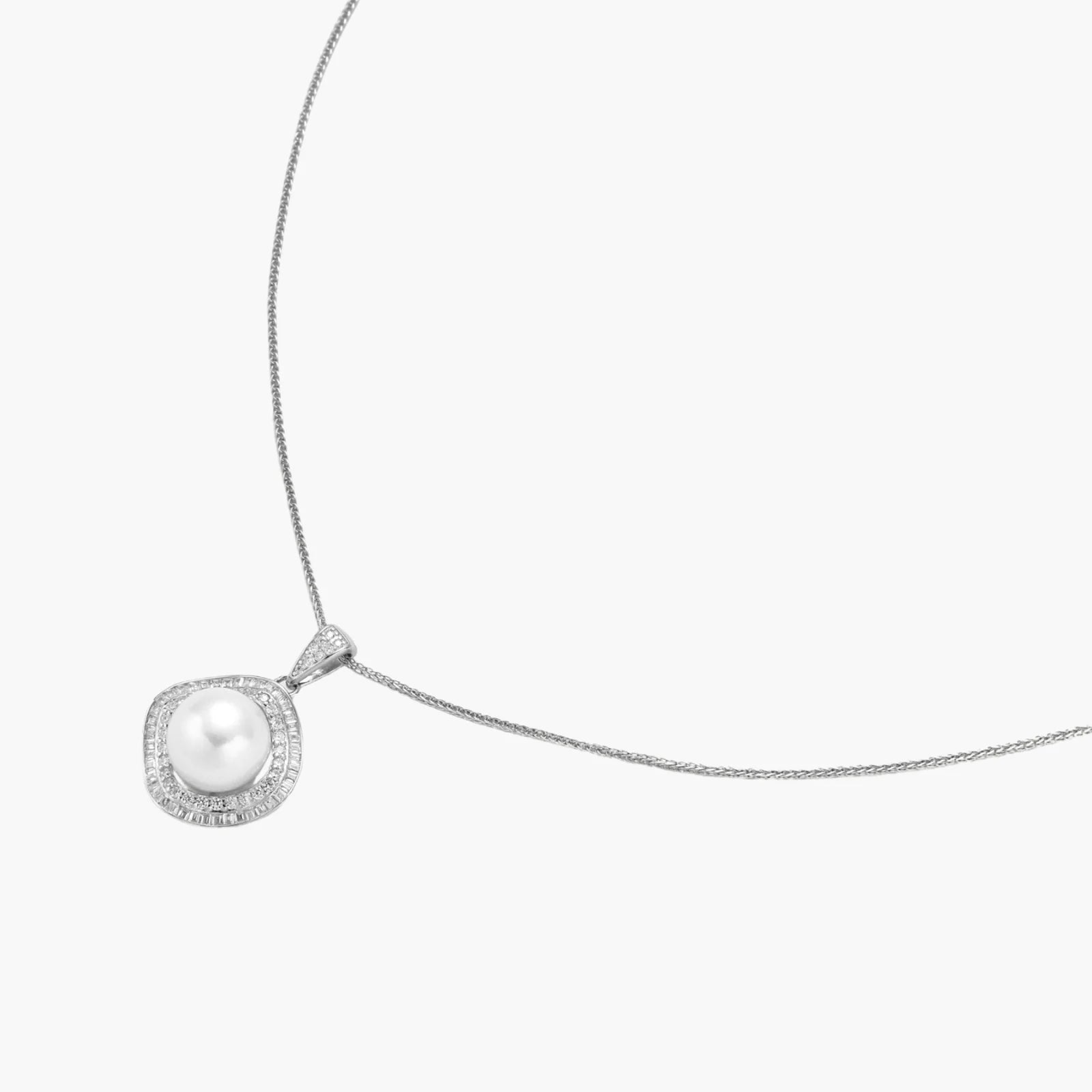Cushion-shaped double halo pendant with 10mm freshwater pearl center on rhodium-plated sterling silver chain