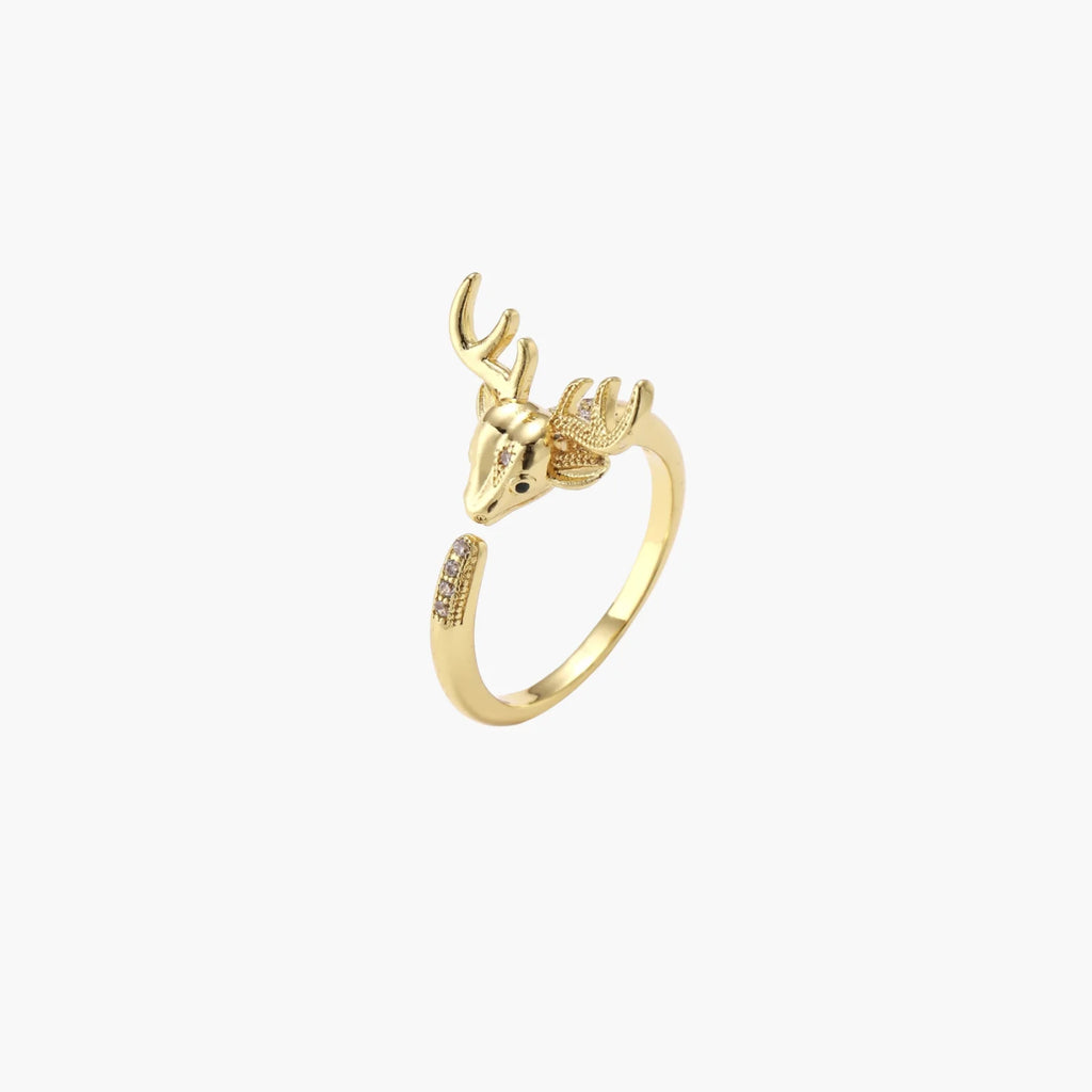 Gold-plated adjustable ring featuring 3D deer head with detailed antlers and cubic zirconia accents on cream background
