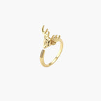 Gold-plated adjustable ring featuring 3D deer head with detailed antlers and cubic zirconia accents on cream background