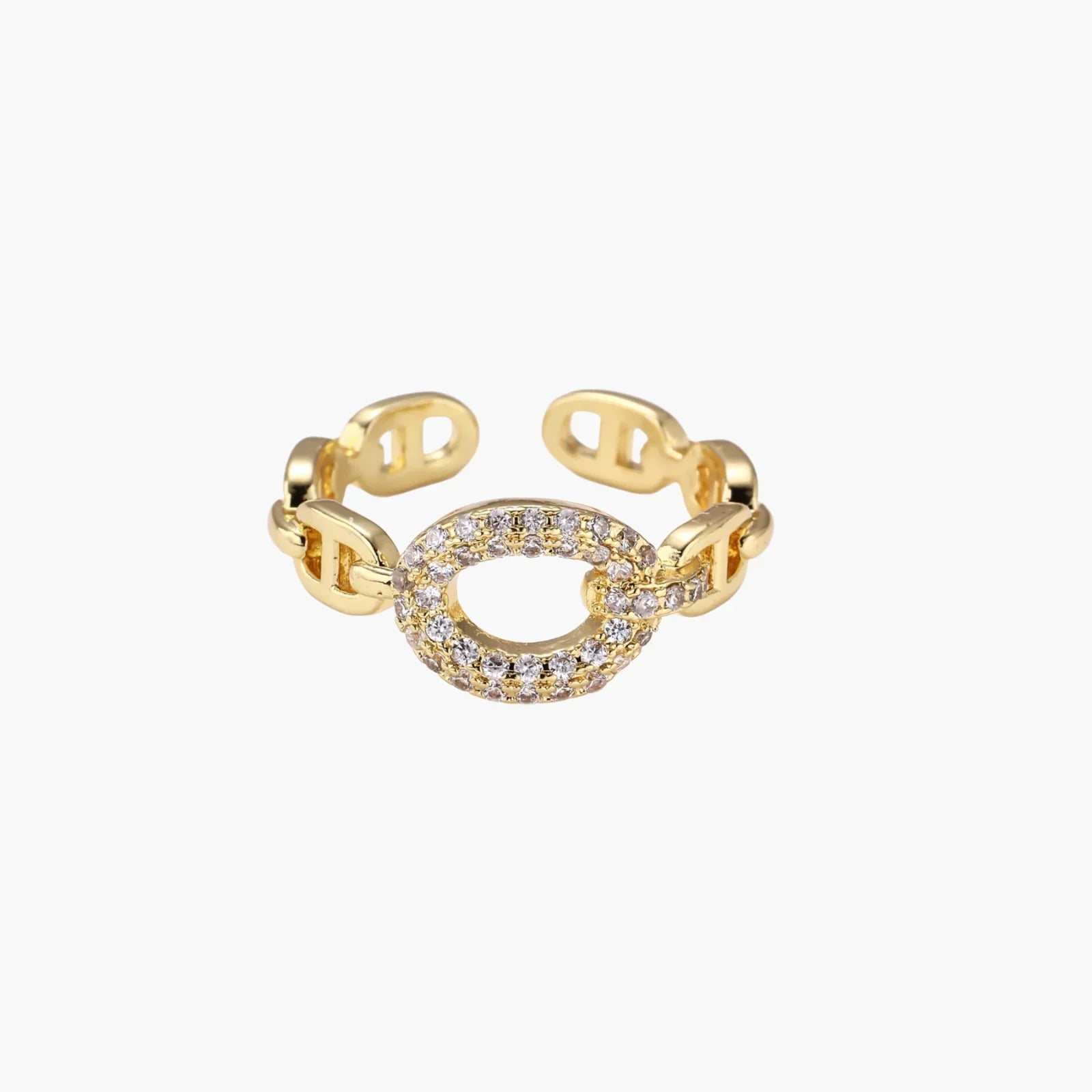 Gold-plated brass chain link ring with one oval CZ-pavÃ© segment on cream background, adjustable cuff style.