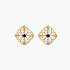 Gold filigree stud earrings with navy lapis lazuli center stone and mother-of-pearl accents in ornate quatrefoil design