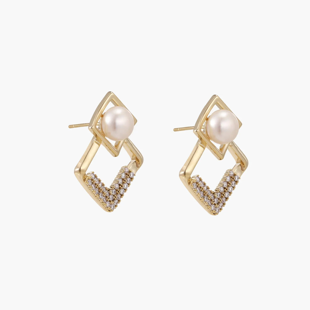 Gold-plated double square frame earrings with freshwater pearl and crystal accents on white background