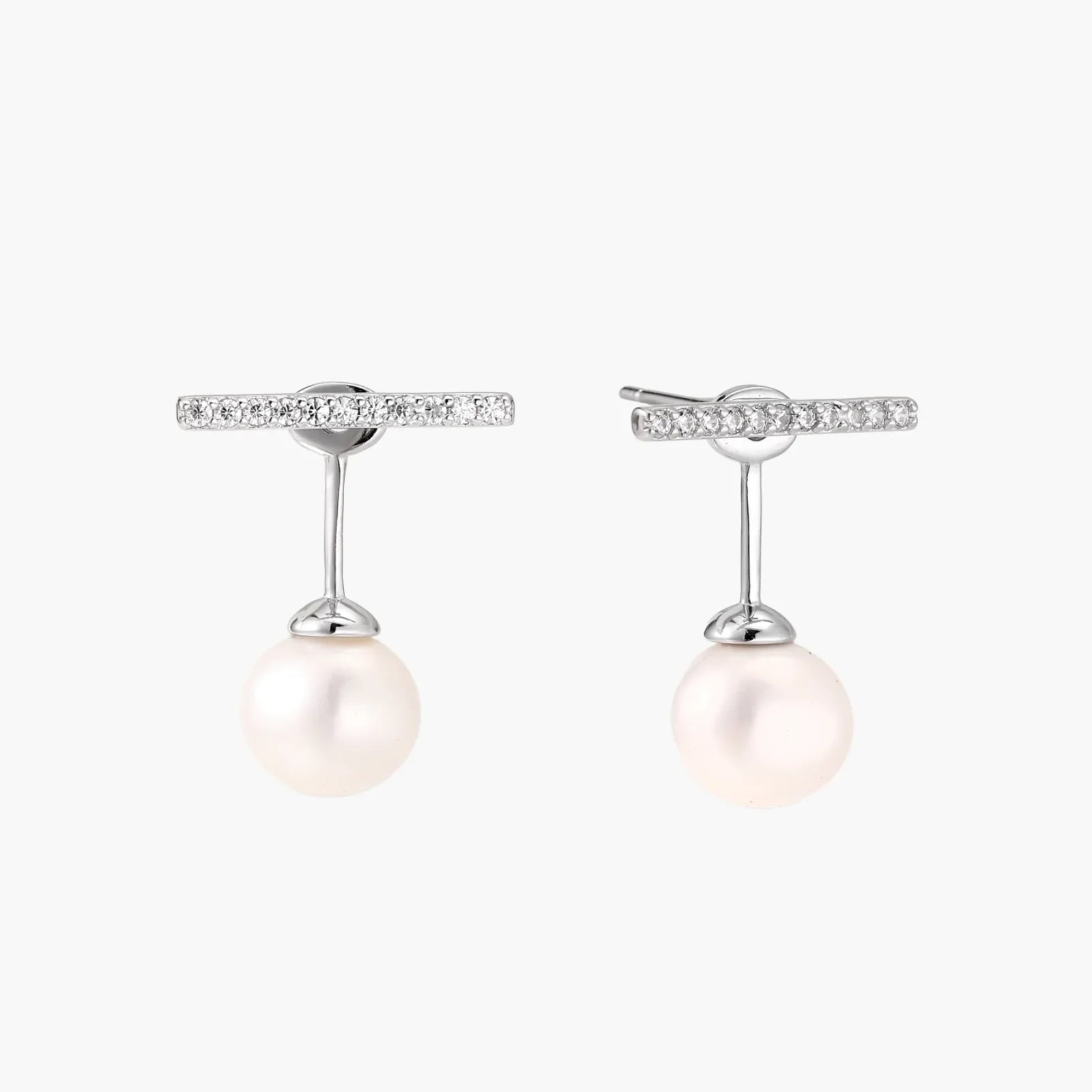 Rhodium-plated sterling silver ear jacket earrings with diamond-set horizontal bar and freshwater pearl drop