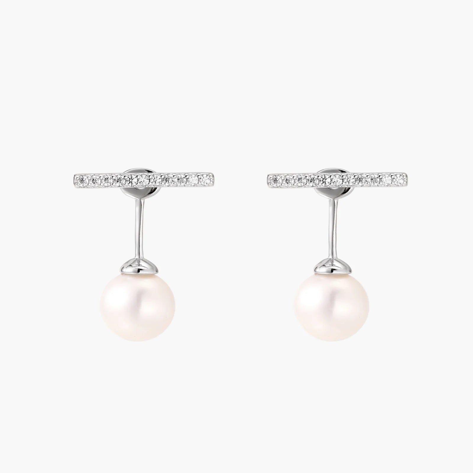 Rhodium-plated sterling silver ear jacket earrings with diamond-set horizontal bar and freshwater pearl drop