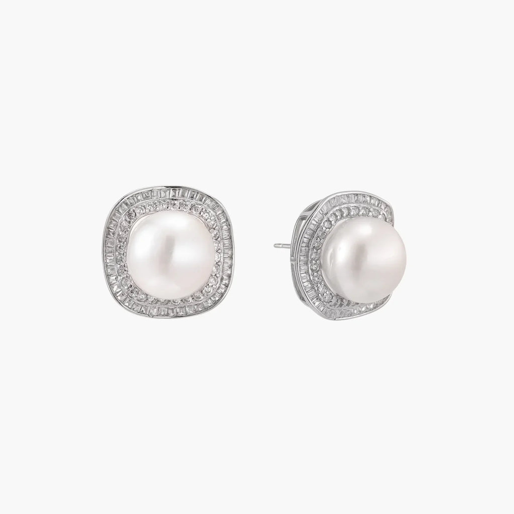 Cushion-shaped sterling silver stud earrings with freshwater pearls surrounded by geometric diamond halos