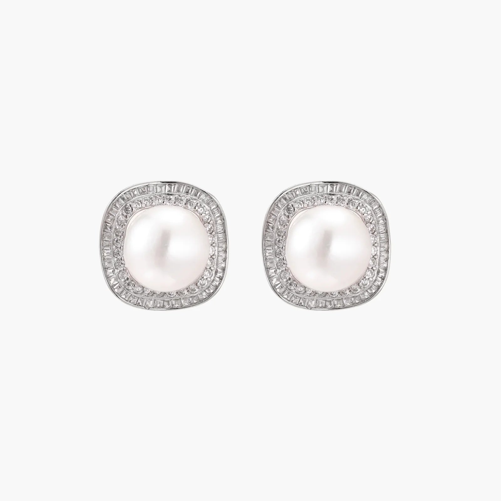 Cushion-shaped sterling silver stud earrings with freshwater pearls surrounded by geometric diamond halos