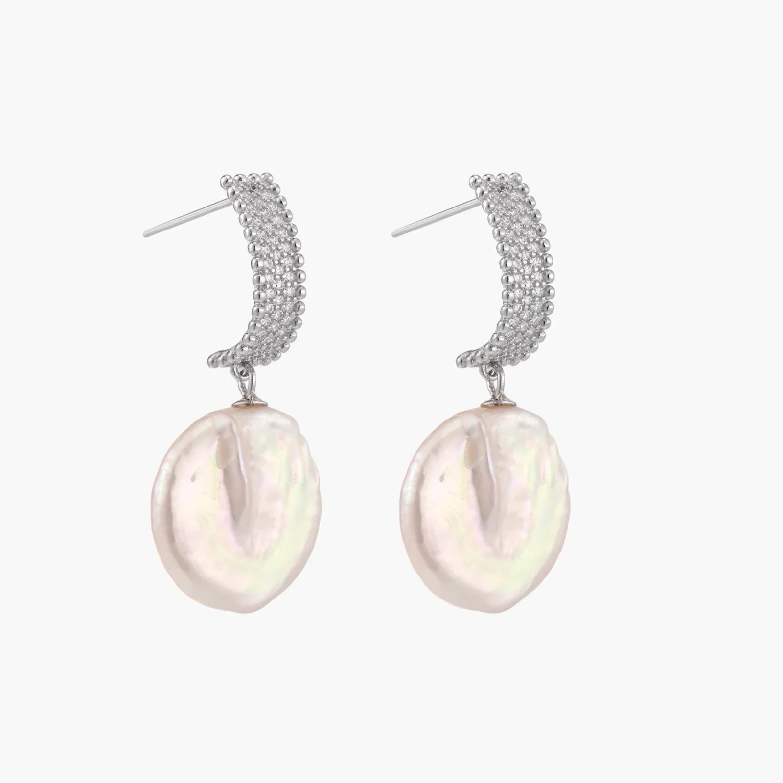 Rhodium-plated silver curved stud with pave stones and baroque pearl drop on white background