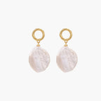 18K gold vermeil twisted circle studs with organic white baroque pearl drops on cream background