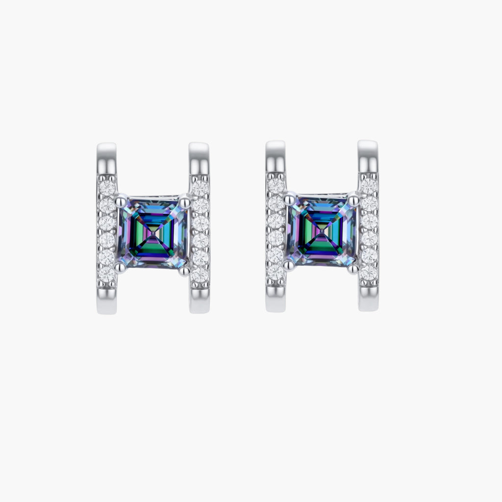 Square moissanite studs in sterling silver geometric setting showing rainbow prismatic fire on white background.